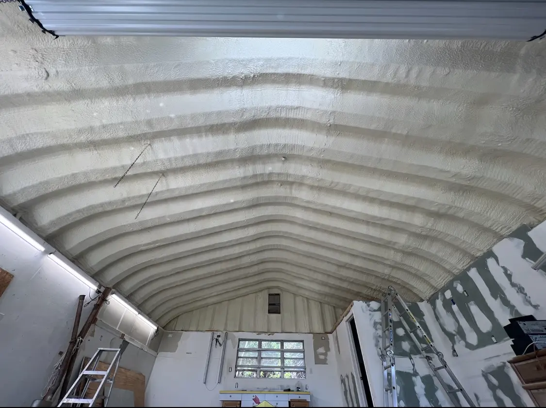 Spray polyurethane foam applied to the underside of a metal roof deck in Boynton Beach